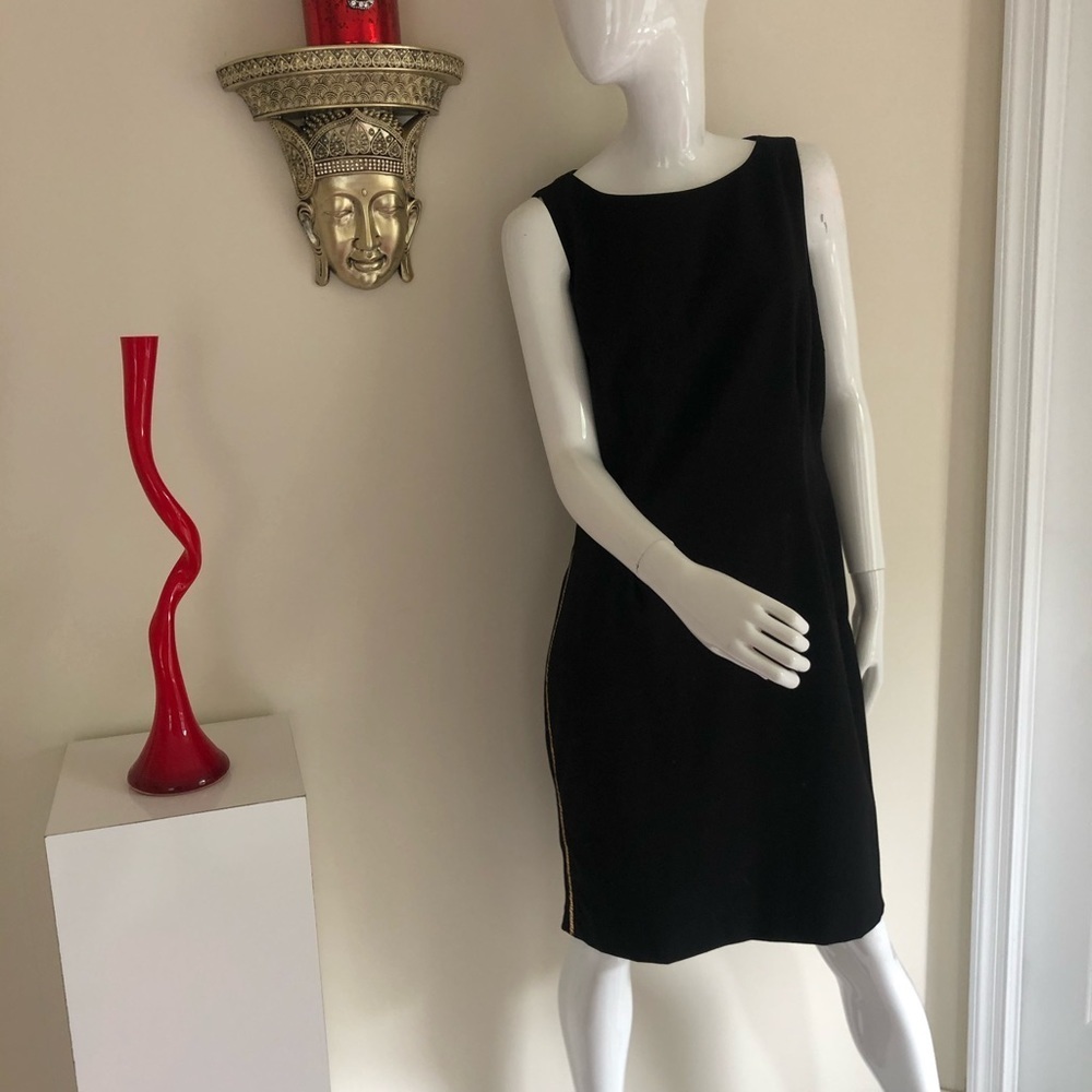 Calvin Klein black dress with gold chain in  side